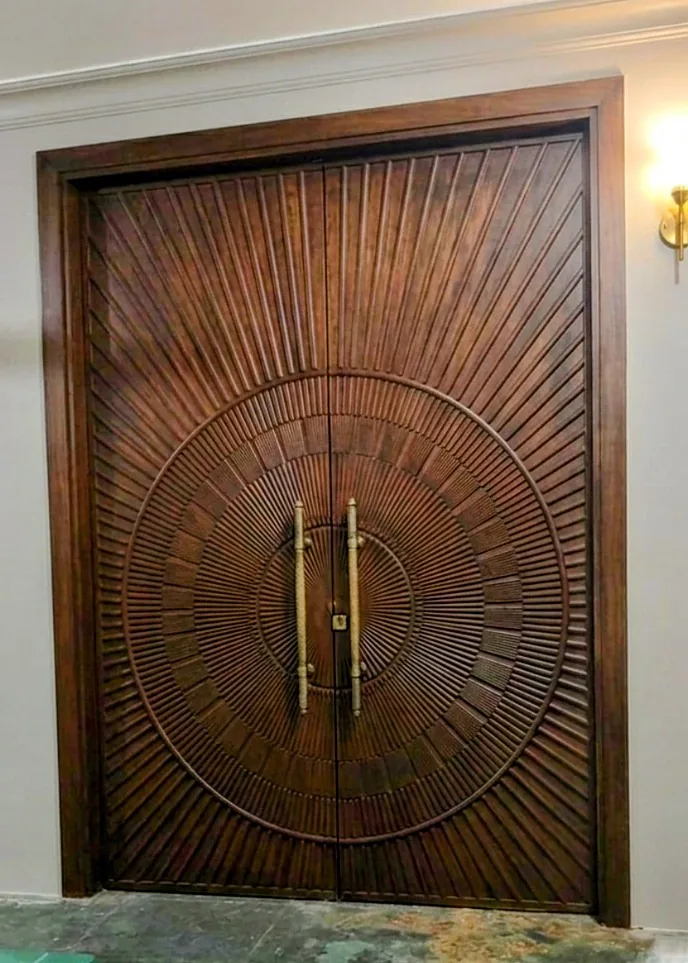 Circular CNC carved wooden door by Arya Timber